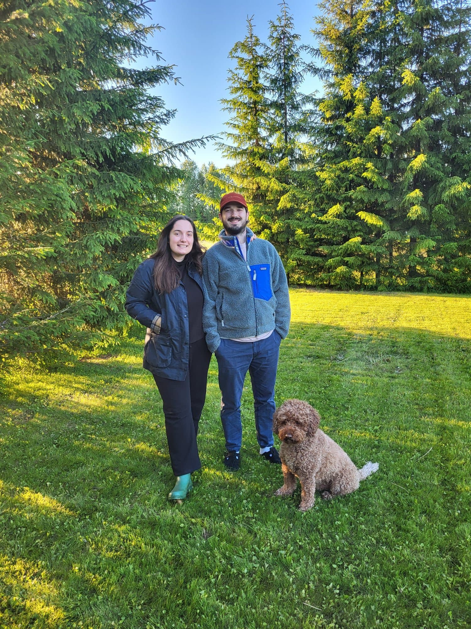 Nick and Laura in the summer garden with Albus